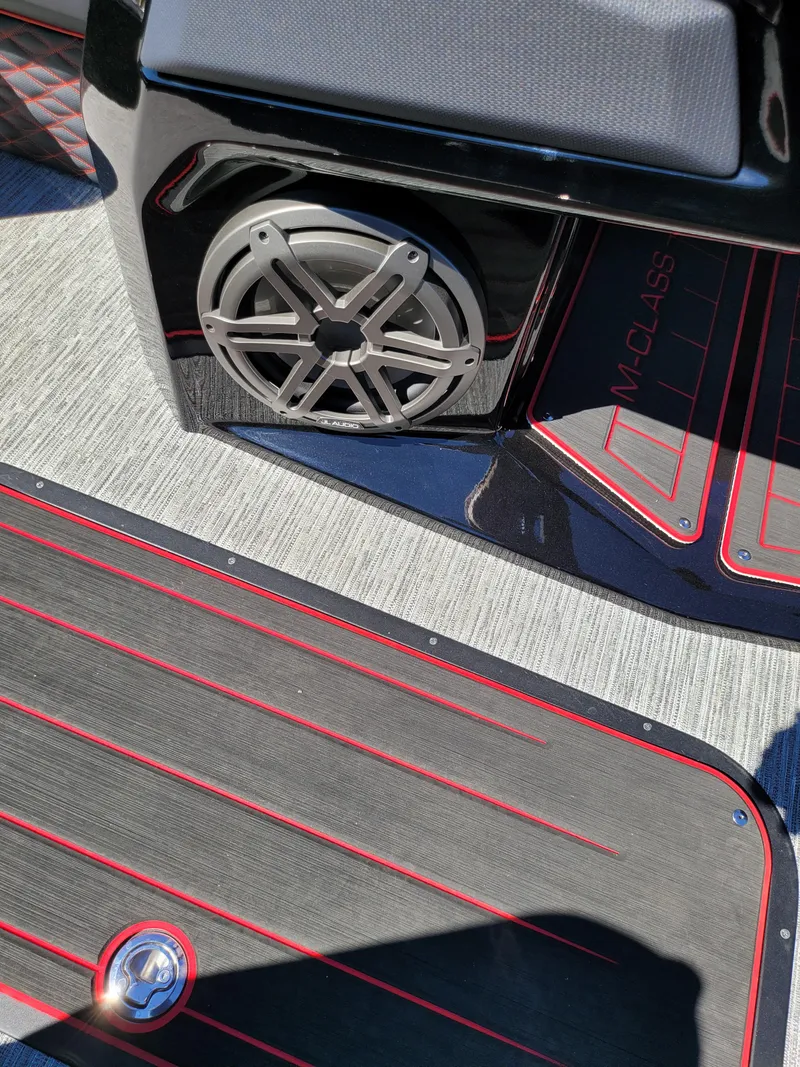 Slide: The Image of 2025 Quest M-22RLS LIMITED interior with speaker and stylish red-accented flooring. - 20