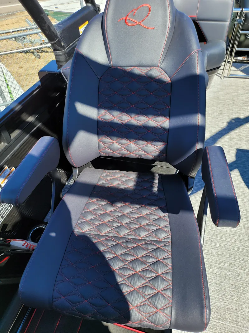 Slide: The Image of Luxurious black leather seat in 2025 Quest M-22RLS LIMITED with red stitching. - 23