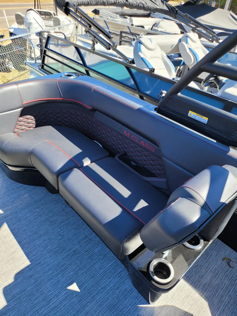 Slide: The Image of 2025 Quest M-22RLS LIMITED boat with luxurious seating and modern design. - 25