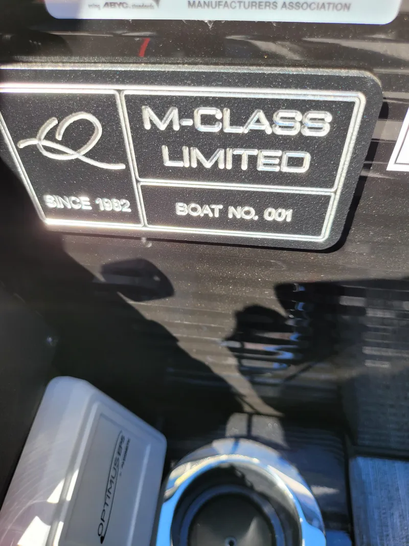Slide: The Image of 2025 Quest M-22RLS LIMITED boat, M-Class Limited badge, Boat No. 001. - 4