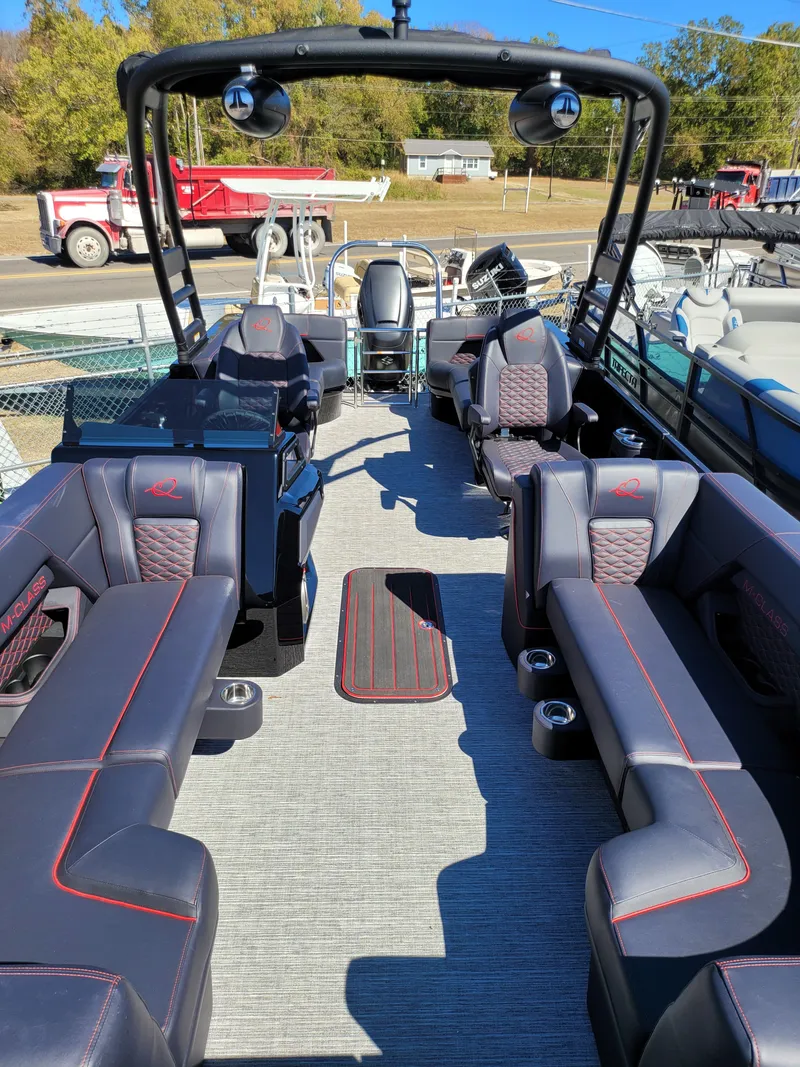 Slide: The Image of 2025 Quest M-22RLS LIMITED boat interior with luxurious seating and modern design. - 6