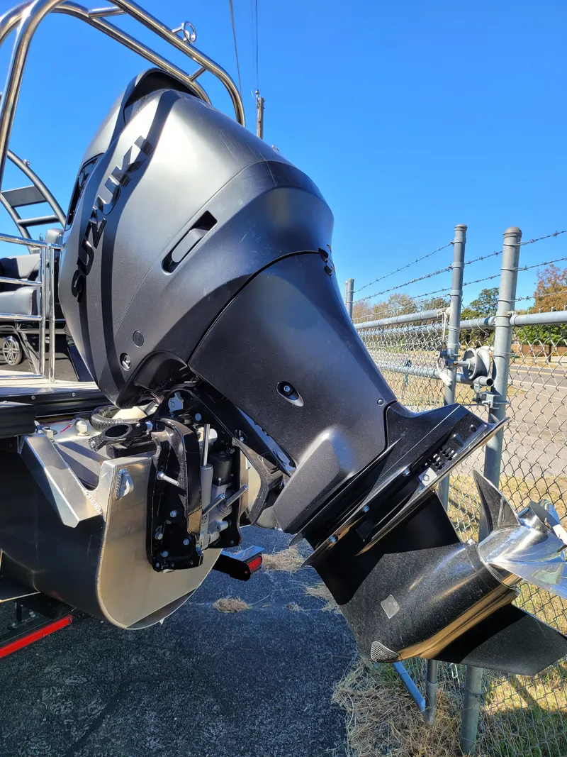 Slide: The Image of 2025 Quest M-22RLS LIMITED boat motor, sleek design, outdoor setting. - 7