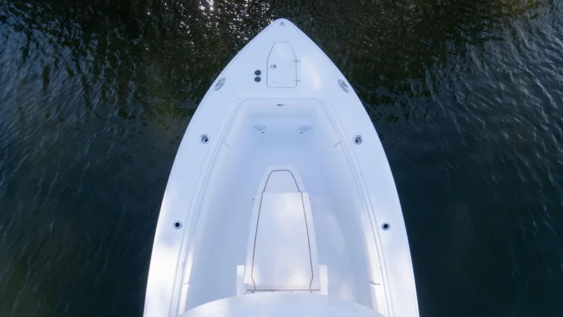 Slide: The Image of 2025 Sea Hunt Gamefish 27 Coffin Box boat, aerial view on water. - 2