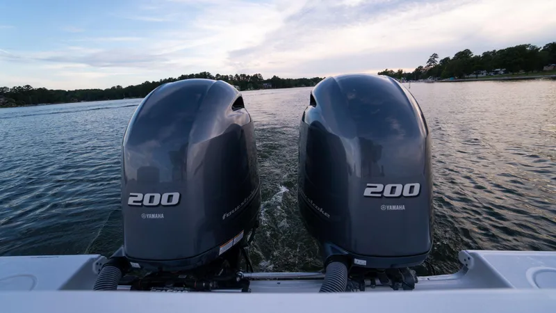 Slide: The Image of Twin Yamaha 200 engines on 2025 Sea Hunt Gamefish 27 Coffin Box boat. - 26