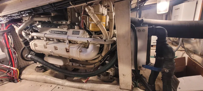 Slide: The Image of Engine room of 1989 Duffy Wilbur 42 Flybridge Cruiser with Caterpillar engine. - 40