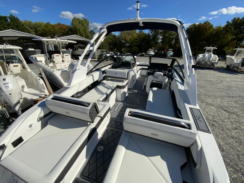 Slide: The Image of 2025 Cobalt R6 Outboard boat with sleek interior design and spacious seating. - 10