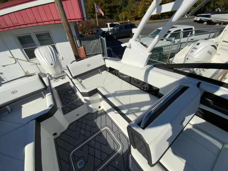 Slide: The Image of 2025 Cobalt R6 Outboard boat interior with modern seating and sleek design. - 15