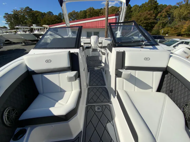 Slide: The Image of 2025 Cobalt R6 Outboard boat interior with sleek white seating and modern design. - 20