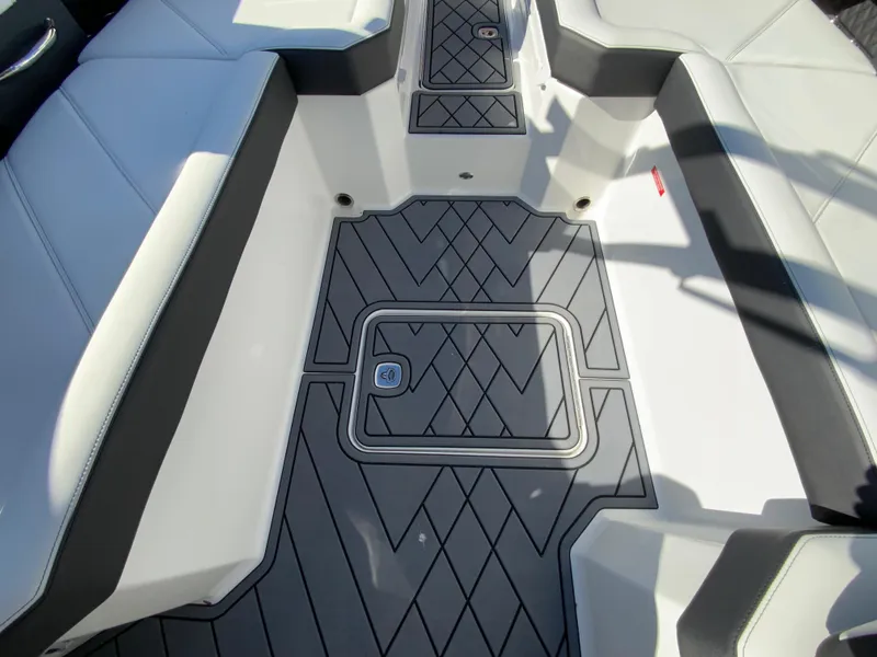 Slide: The Image of 2025 Cobalt R6 Outboard boat interior with sleek seating and modern flooring design. - 29
