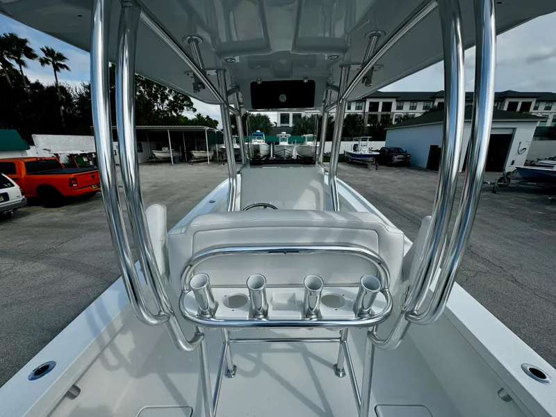 Slide: The Image of 2025 Pair Customs 27 Center Console boat with sleek design and chrome details. - 13
