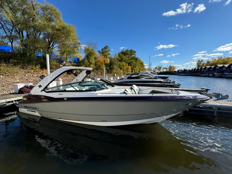 The Image of 2018 Monterey 328 Super Sport boat docked on a sunny day with clear skies. - 0
