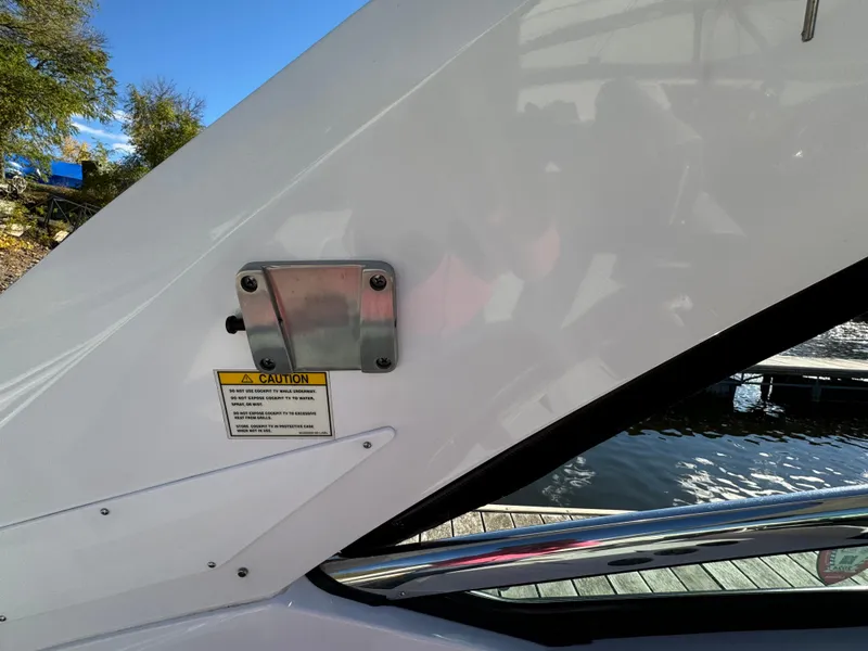 Slide: The Image of 2018 Monterey 328 Super Sport boat detail with caution label and metal fixture. - 12