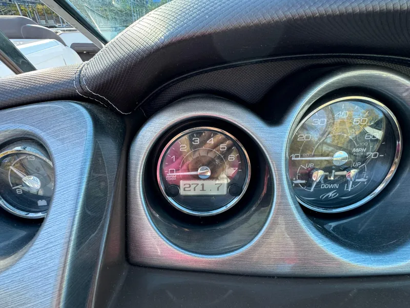 Slide: The Image of Dashboard of a 2018 Monterey 328 Super Sport boat showing gauges and controls. - 20