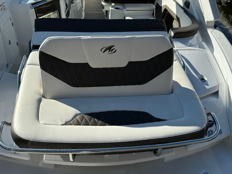 Slide: The Image of 2018 Monterey 328 Super Sport boat seat with black and white upholstery. - 9