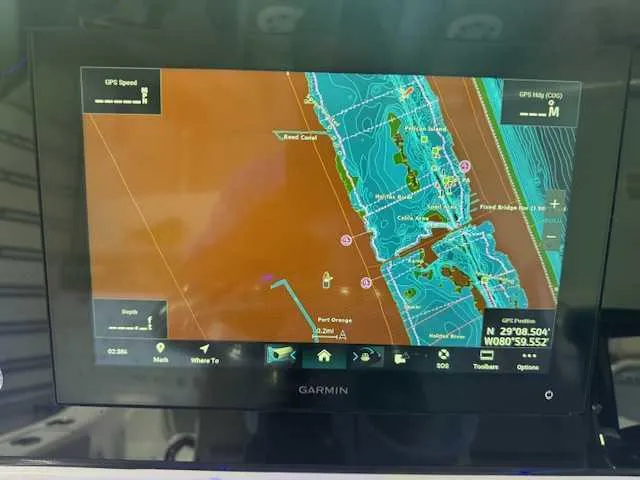 Slide: The Image of Garmin GPS navigation screen on 2025 Sportsman Open 212 boat. - 14