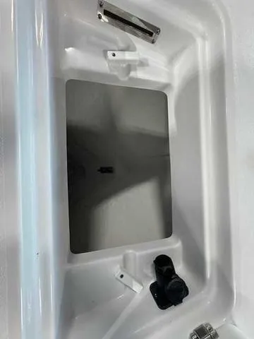 Slide: The Image of 2025 Sportsman Open 212 boat interior compartment detail. - 25