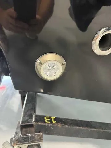 Slide: The Image of 2025 Sportsman Open 212 boat interior with cushioned seating and modern design. - 35