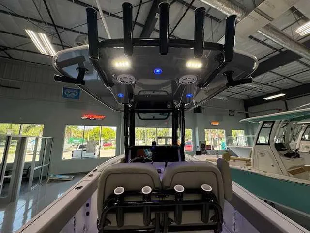 Slide: The Image of 2025 Sportsman Open 212 boat interior with modern dashboard and seating. - 40