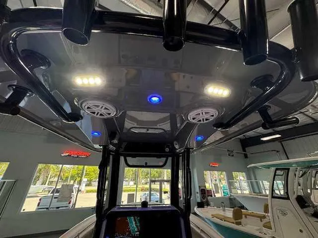 Slide: The Image of Sportsman Open 212 boat wireless charging pad, 2025 model, with dual USB ports. - 46