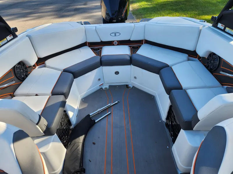 Slide: The Image of 2021 Tahoe 210 S boat interior with spacious seating and modern design. - 10