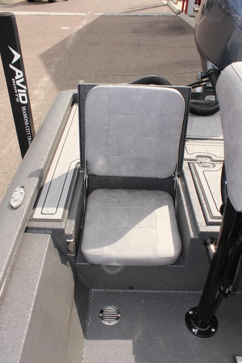 Slide: The Image of 2025 Avid 21 FSX boat seat with gray upholstery. - 13