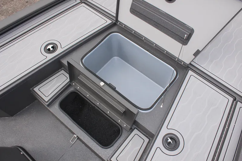 Slide: The Image of 2025 Avid 21 FSX boat storage compartments with open lids, showcasing interior space. - 24
