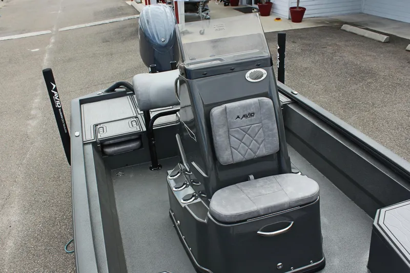 Slide: The Image of 2025 Avid 21 FSX boat interior with gray seating and console. - 30