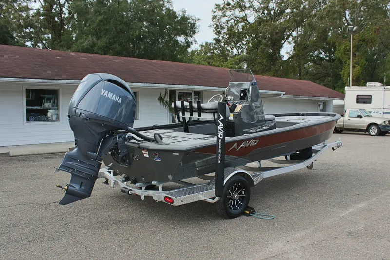 Slide: The Image of 2025 Avid 21 FSX boat with Yamaha outboard motor on trailer. - 6