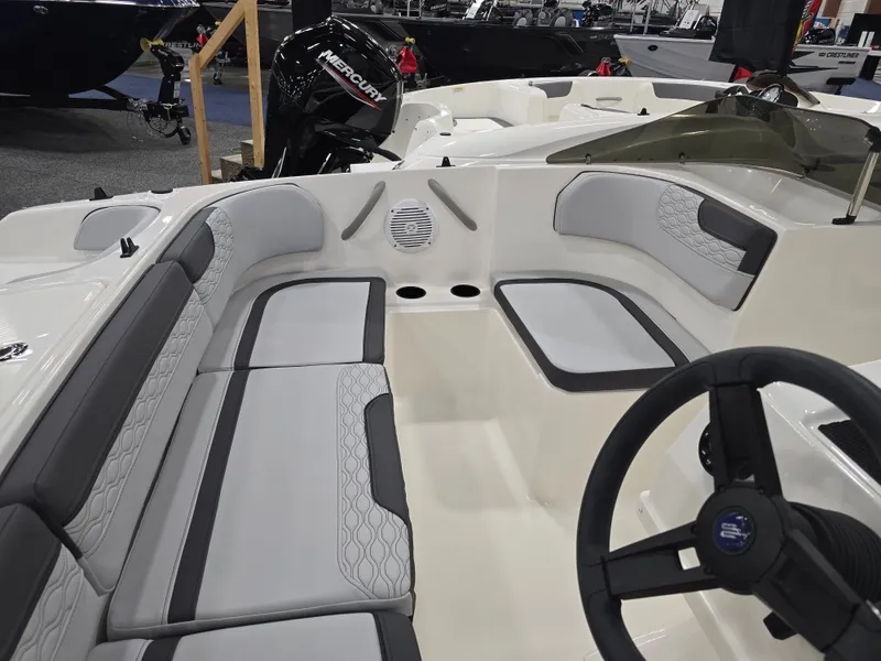 Slide: The Image of Interior of 2025 Bayliner M17 boat with gray upholstery. - 13