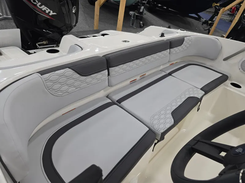 Slide: The Image of Interior of 2025 Bayliner M17 with gray upholstery. - 15