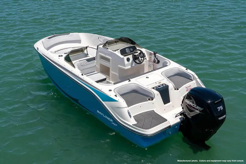 Slide: The Image of 2025 Bayliner M17 boat displayed at a trade show. - 2