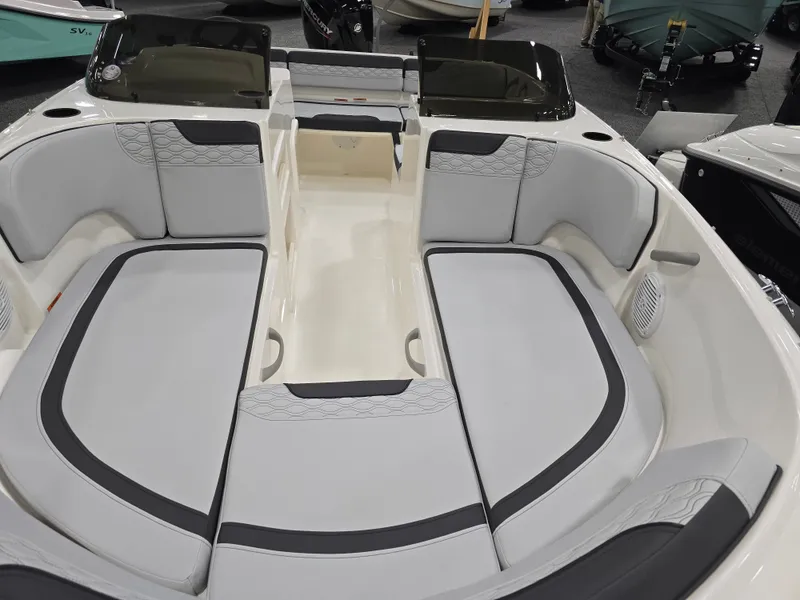 Slide: The Image of Interior of 2025 Bayliner M17 boat with gray upholstery. - 7