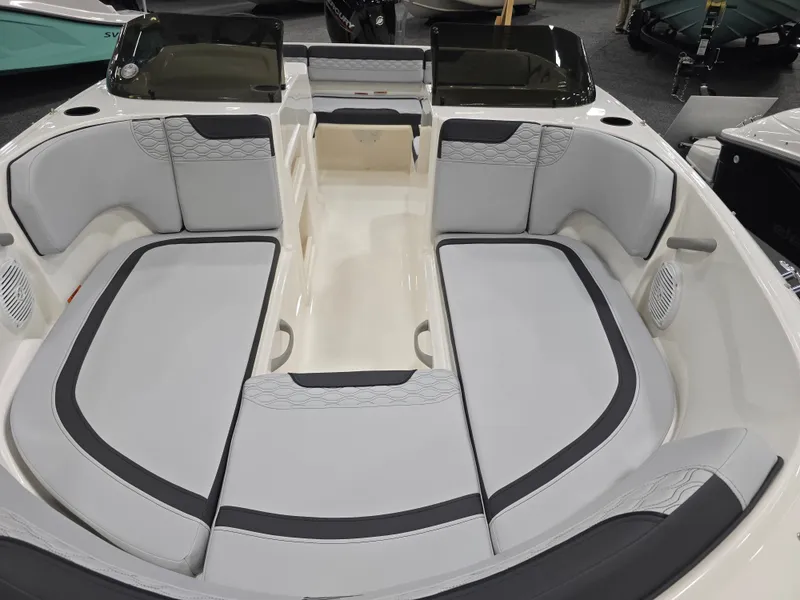 Slide: The Image of Interior of 2025 Bayliner M17 boat with gray upholstery. - 8