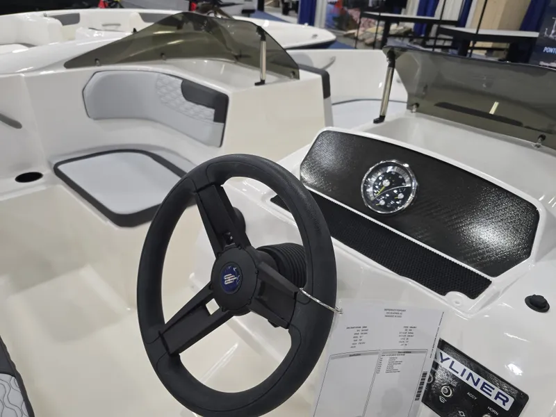 Slide: The Image of Interior view of Bayliner M17 boat, model year 2025. - 9