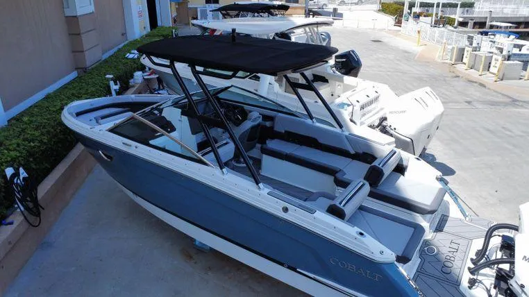 Slide: The Image of 2023 Cobalt R8 Outboard boat with sleek design and spacious seating. - 18