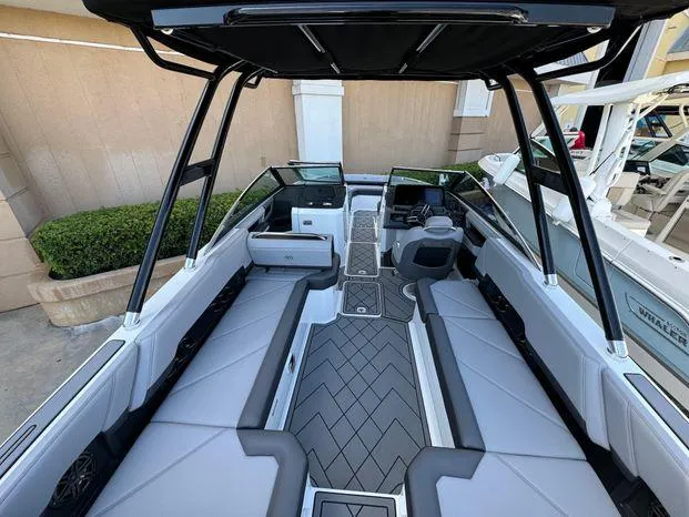 Slide: The Image of 2023 Cobalt R8 Outboard boat interior with sleek seating and modern design. - 22