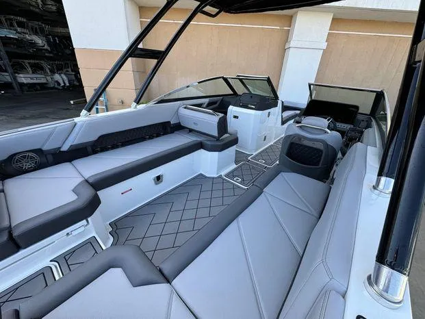 Slide: The Image of 2023 Cobalt R8 Outboard boat interior with sleek seating and modern design. - 24