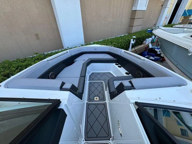 Slide: The Image of 2023 Cobalt R8 Outboard boat interior with sleek seating and modern design. - 32