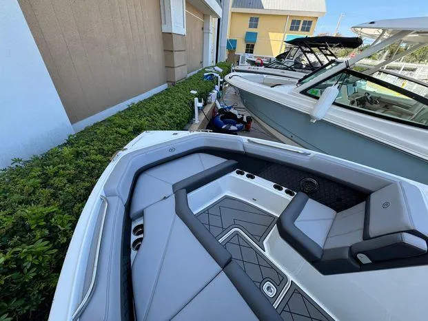 Slide: The Image of 2023 Cobalt R8 Outboard boat with sleek seating and modern design. - 33