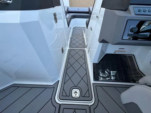 Slide: The Image of 2023 Cobalt R8 Outboard interior with sleek, modern design and non-slip flooring. - 40
