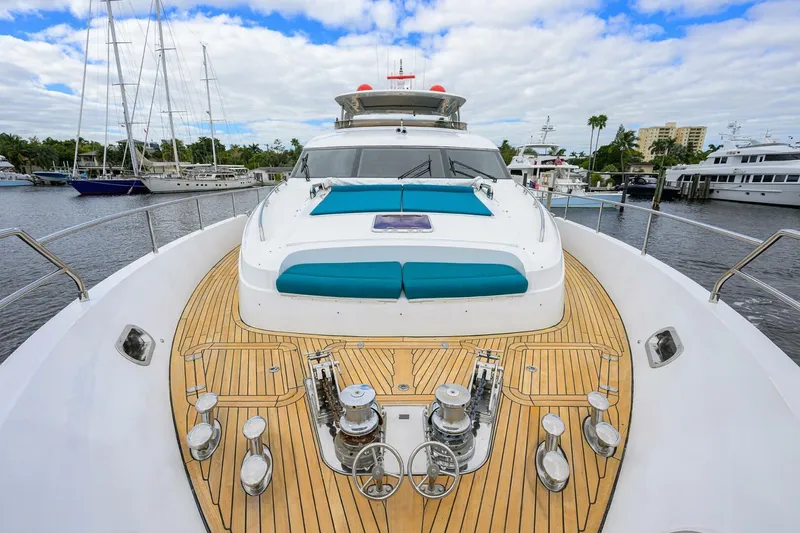 Slide: The Image of Luxury Princess 95 yacht, 2009 model, with spacious deck and sleek design in marina. - 14