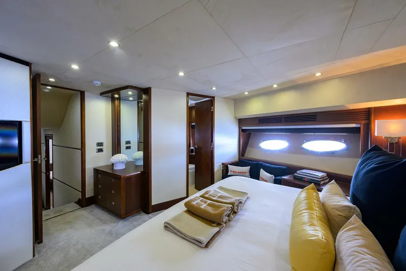 Slide: The Image of Luxurious cabin interior of 2009 Princess 95 yacht with elegant furnishings. - 44