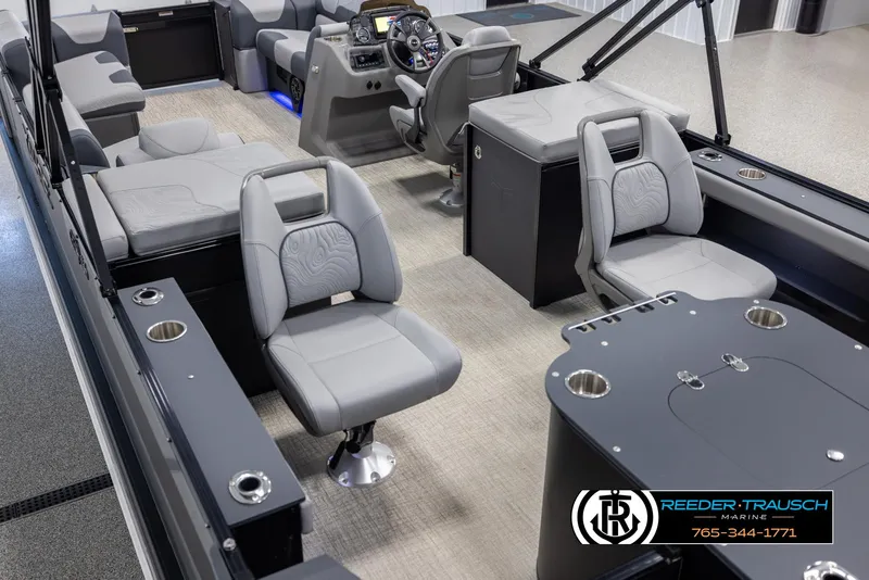 Slide: The Image of Interior of 2025 Tahoe TGO RF boat with modern seating and control panel. - 11