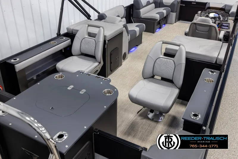 Slide: The Image of Interior of 2025 Tahoe TGO RF boat with modern seating and control panel. - 12