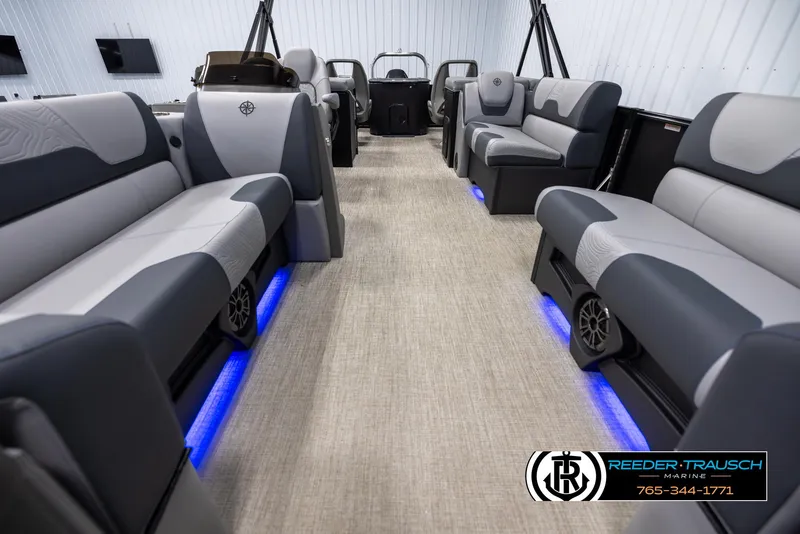 Slide: The Image of Luxurious interior of 2025 Tahoe TGO RF boat with modern seating and blue LED lighting. - 13