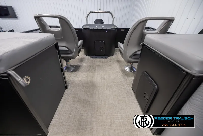 Slide: The Image of Interior of 2025 Tahoe TGO RF boat with seating and storage compartments. - 15