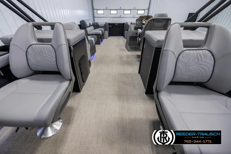 Slide: The Image of Interior of 2025 Tahoe TGO RF boat with modern seating and sleek design. - 16