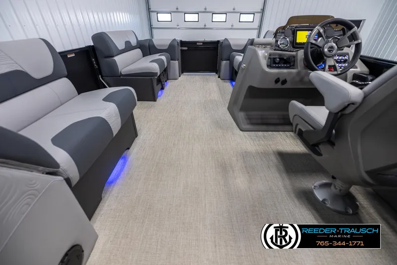 Slide: The Image of Interior of 2025 Tahoe TGO RF boat with modern seating and steering console. - 17