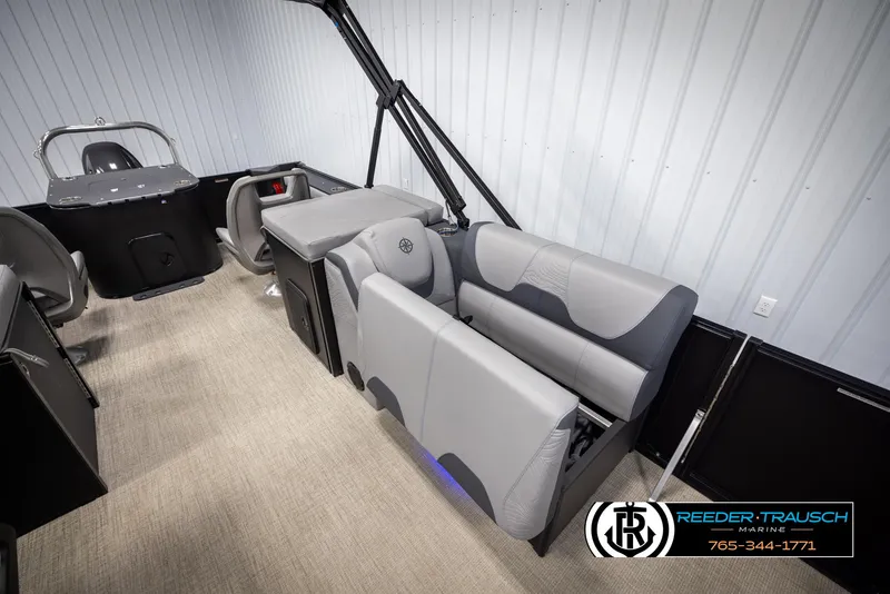 Slide: The Image of Interior of 2025 Tahoe TGO RF boat with gray seating and modern design. - 22