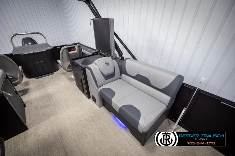 Slide: The Image of Interior of 2025 Tahoe TGO RF boat with gray seating and modern design. - 23